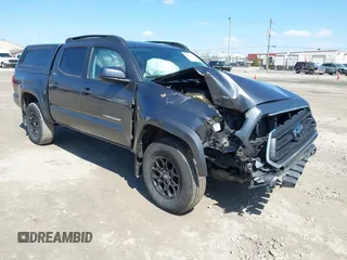 2021 Toyota Tacoma 4WD SR with VIN 3TMCZ5AN7MM442237, listed as a IAAI auction lot 41993450 with 30,148 mi miles. Bid and sale history available at carsss.com. Image 1.