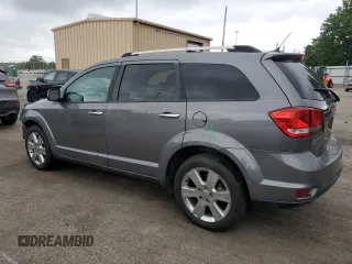 2012 Dodge Journey Crew with VIN 3C4PDDDG6CT275610, listed as a Copart auction lot 57063865 with 126,319 mi miles and Salvage title. Bid and sale history available at DreamBid. Image 2.