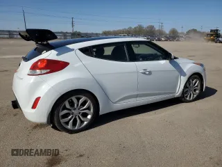 2013 Hyundai Veloster w/Gray Int z VIN KMHTC6ADXDU127194, wystawiony jako Copart lot #51751345 z przebiegiem 122 221 mil mil oraz Szkoda całkowita • Salvage title. Historia ofert i sprzedaży dostępna na DreamBid. Obrazek 3.