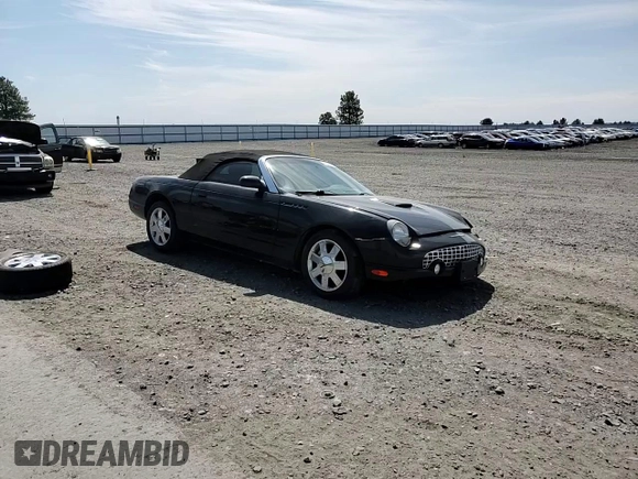 2002 Ford Thunderbird Hardtop Premium z VIN 1FAHP60A92Y117614, wystawiony jako Copart lot #59344735 z przebiegiem 83 723 mil mil oraz Szkoda całkowita • Salvage title. Historia ofert i sprzedaży dostępna na DreamBid. Obrazek 14.