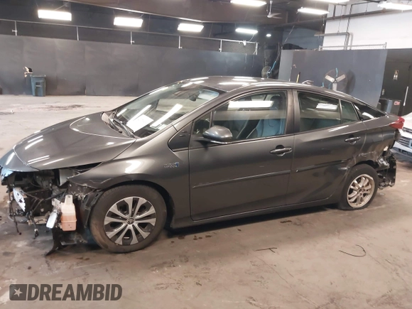 2021 Toyota Prius LE with VIN JTDKAMFP8M3175487, listed as a IAAI auction lot 42176936 with 78,153 mi miles and . Bid and sale history available at DreamBid. Image 6.