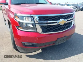 2015 Chevrolet Suburban LT with VIN 1GNSKJKC5FR726299, listed as a IAAI auction lot 42740904 with 96,700 mi miles and . Bid and sale history available at DreamBid. Image 6.
