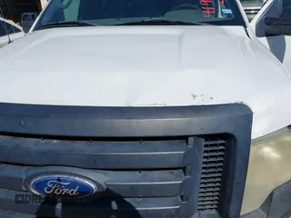 2011 Ford F-150 XL with VIN 1FTMF1CM0BKE04556, listed as a IAAI auction lot 41968512 with 180,657 mi miles. Bid and sale history available at carsss.com. Image 6.