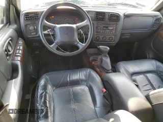 2000 Oldsmobile Bravada z VIN 1GHDT13W7Y2351268, wystawiony jako Copart lot #66408824 z przebiegiem 134 512 mil mil oraz Tytuł czysty. Historia ofert i sprzedaży dostępna na DreamBid. Obrazek 8.