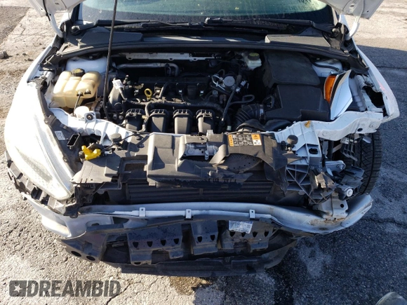 2017 Ford Focus SE with VIN 1FADP3F28HL309268, listed as a Copart auction lot 57995985 with 99,277 mi miles and Salvage title. Bid and sale history available at DreamBid. Image 11.