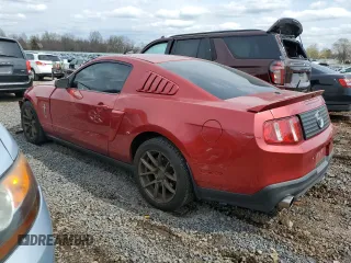2010 Ford Mustang V6 with VIN 1ZVBP8AN3A5133074, listed as a Copart auction lot 52142895 with 124,033 mi miles and Salvage Title. Bid and sale history available at DreamBid. Image 2.
