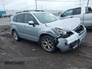 2018 Subaru Forester Touring with VIN JF2SJAWC6JH496875, listed as a IAAI auction lot 42347532 with 70,978 mi miles and . Bid and sale history available at DreamBid. Image 1.