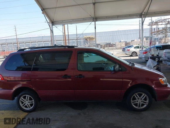 2002 Toyota Sienna LE with VIN 4T3ZF13C02U473719, listed as a IAAI auction lot 42272685 with 301,288 mi miles and . Bid and sale history available at DreamBid. Image 13.