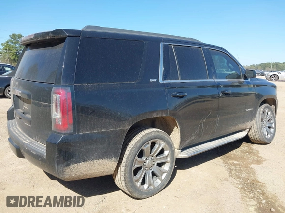 2015 GMC Yukon SLT z VIN 1GKS1BKC8FR112952, wystawiony jako IAAI lot #41836398 z przebiegiem 155 329 mil mil oraz . Historia ofert i sprzedaży dostępna na DreamBid. Obrazek 4.
