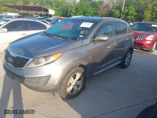 2013 Kia Sportage LX with VIN KNDPB3A26D7406680, listed as a IAAI auction lot 42004413 with 170,221 mi miles. Bid and sale history available at carsss.com. Image 2.