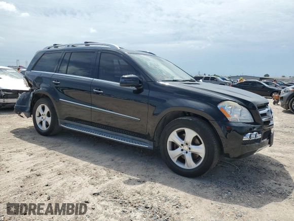 2011 Mercedes-Benz GL-Class GL 450 with VIN 4JGBF7BEXBA708581, listed as a Copart auction lot 69159824 with 151,477 mi miles and Salvage Title. Bid and sale history available at carsss.com. Image 4.