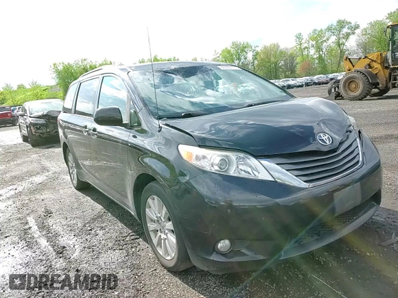2014 Toyota Sienna Limited z VIN 5TDDK3DC5ES086024, wystawiony jako Copart lot #56299555 z przebiegiem 136 876 mil mil oraz Szkoda całkowita • Salvage title. Historia ofert i sprzedaży dostępna na DreamBid. Obrazek 14.
