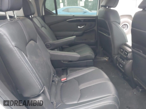 2023 Honda Pilot EX-L with VIN 5FNYG1H58PB016138, listed as a IAAI auction lot 40591717 with 10,068 mi miles and . Bid and sale history available at DreamBid. Image 8.