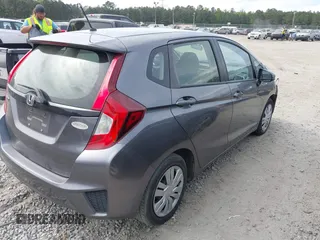 2016 Honda Fit LX with VIN JHMGK5H58GX034743, listed as a IAAI auction lot 42113760 with 98,283 mi miles and . Bid and sale history available at DreamBid. Image 4.