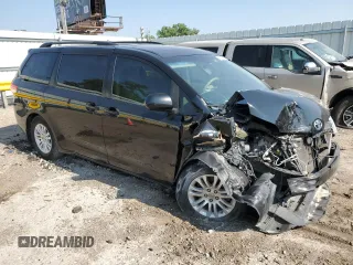 2012 Toyota Sienna XLE AAS with VIN 5TDYK3DC6CS211062, listed as a Copart auction lot 59404205 with Not provided miles and Salvage title. Bid and sale history available at DreamBid. Image 4.