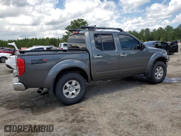 2008 Nissan Frontier SE with VIN 1N6AD07UX8C406795, listed as a Copart auction lot 61303185 with 145,742 mi miles and Salvage title. Bid and sale history available at DreamBid. Image 3.