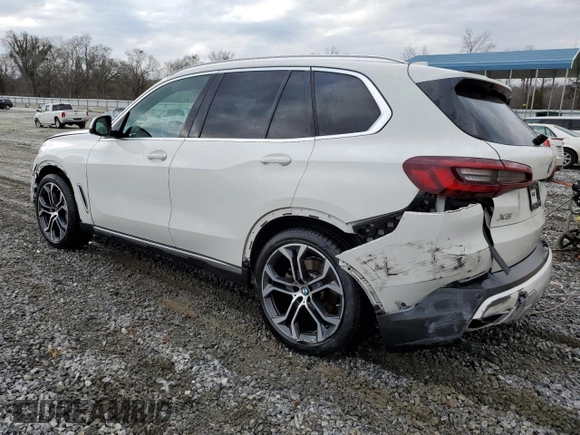 2021 BMW X5 sDrive40i with VIN 5UXCR4C04M9E30879, listed as a Copart auction lot 39577953 with 19,276 mi miles. Bid and sale history available at carsss.com. Image 2.