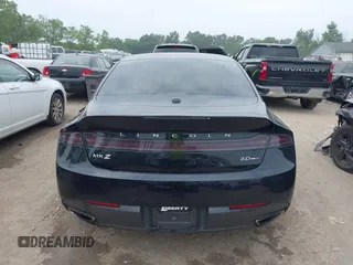 2016 Lincoln MKZ z VIN 3LN6L2G9XGR601231, wystawiony jako IAAI lot #42699222 z przebiegiem 107 081 mil mil oraz . Historia ofert i sprzedaży dostępna na DreamBid. Obrazek 16.