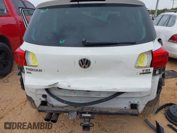 2016 Volkswagen Tiguan S with VIN WVGBV7AXXGW585445, listed as a IAAI auction lot 42083377 with 111,011 mi miles and . Bid and sale history available at DreamBid. Image 16.