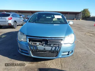 2008 Volkswagen Eos Turbo z VIN WVWBA71F68V026196, wystawiony jako IAAI lot #41238435 z przebiegiem 102 643 mil mil oraz . Historia ofert i sprzedaży dostępna na DreamBid. Obrazek 12.
