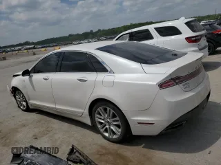 2014 Lincoln MKZ Hybrid z VIN 3LN6L2LU2ER816576, wystawiony jako Copart lot #57030235 z przebiegiem 221 863 mil mil oraz Szkoda całkowita • Salvage title. Historia ofert i sprzedaży dostępna na DreamBid. Obrazek 2.