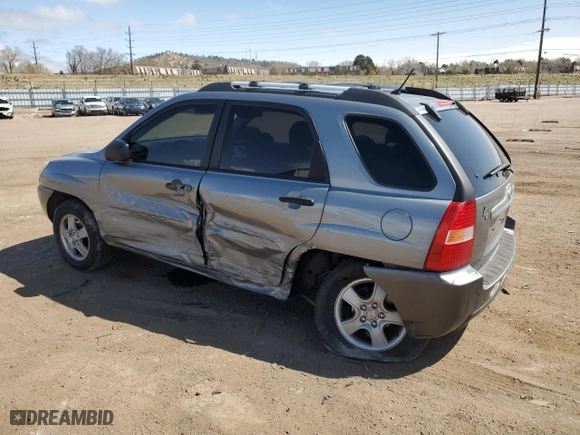 2007 Kia Sportage LX with VIN KNDJF724277378611, listed as a Copart auction lot 51516305 with 150,856 mi miles and Salvage Title. Bid and sale history available at carsss.com. Image 2.