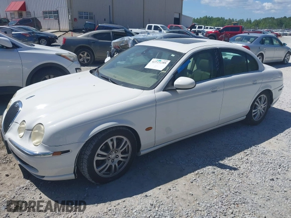 2003 Jaguar S-Type with VIN SAJEA01U93HM89560, listed as a IAAI auction lot 42115289 with 236,905 mi miles and . Bid and sale history available at DreamBid. Image 2.