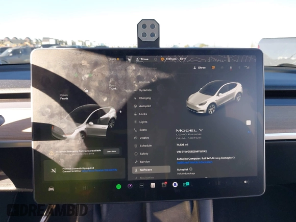 2021 Tesla Model Y Long Range with VIN 5YJYGDEE5MF191142, listed as a IAAI auction lot 41448514 with 71,626 mi miles. Bid and sale history available at carsss.com. Image 7.