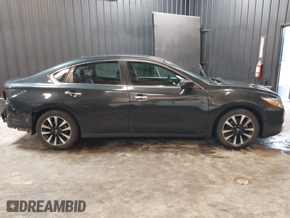2018 Nissan Altima SR with VIN 1N4AL3AP9JC121415, listed as a IAAI auction lot 41528034 with 136,793 mi miles and . Bid and sale history available at carsss.com. Image 14.