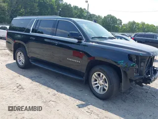 2020 Chevrolet Suburban LS z VIN 1GNSCGKCXLR238669, wystawiony jako IAAI lot #42388187 z przebiegiem 190 390 mil mil oraz . Historia ofert i sprzedaży dostępna na DreamBid. Obrazek 1.