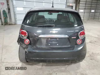 2014 Chevrolet Sonic LTZ z VIN 1G1JE6SB8E4233382, wystawiony jako Copart lot #48941115 z przebiegiem 95 876 mil mil oraz Szkoda całkowita • Salvage title. Historia ofert i sprzedaży dostępna na DreamBid. Obrazek 6.