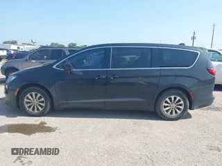 2017 Chrysler Pacifica Touring with VIN 2C4RC1DG6HR509717, listed as a IAAI auction lot 42228096 with 86,956 mi miles and . Bid and sale history available at DreamBid. Image 14.