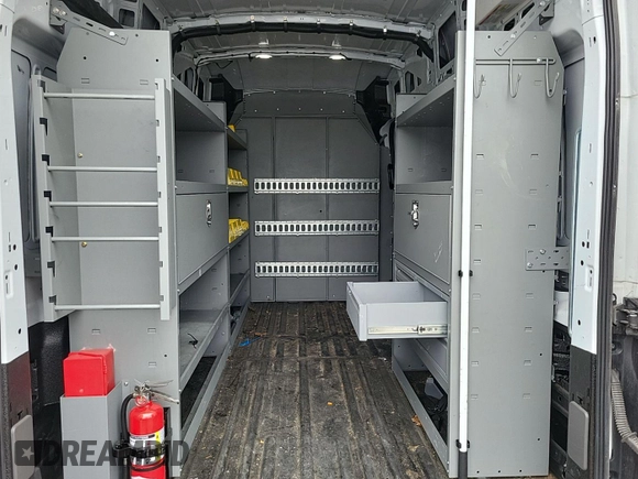 2023 Ford Transit Cargo с VIN 1FTBR2X85PKA59310, выставлен на аукционе IAAI как лот 42534465 с пробегом 50 687 миль миль и . История ставок и продаж доступна на DreamBid. Изображение 2.