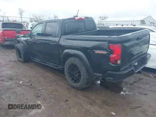 2023 Chevrolet Colorado 4WD Trail Boss with VIN 1GCPTEEK9P1196702, listed as a IAAI auction lot 41924581 with 21,882 mi miles. Bid and sale history available at carsss.com. Image 3.