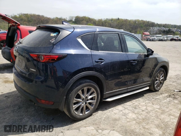 2020 Mazda CX-5 Grand Touring with VIN JM3KFBDM0L0767634, listed as a Copart auction lot 54433935 with 57,901 mi miles and Salvage Title. Bid and sale history available at carsss.com. Image 3.
