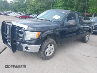 2014 Ford F-150 XL with VIN 1FTFX1EF0EKG08427, listed as a IAAI auction lot 42127077 with 203,377 mi miles. Bid and sale history available at carsss.com. Image 2.