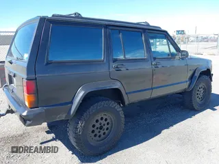 1994 Jeep Cherokee Sport with VIN 1J4FJ68S2RL175128, listed as a IAAI auction lot 41722936 with 345,700 mi miles and . Bid and sale history available at DreamBid. Image 4.