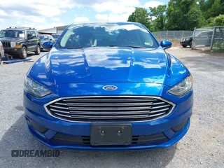 2018 Ford Fusion SE z VIN 3FA6P0LU9JR171096, wystawiony jako IAAI lot #42329683 z przebiegiem 126 463 mil mil oraz . Historia ofert i sprzedaży dostępna na DreamBid. Obrazek 12.