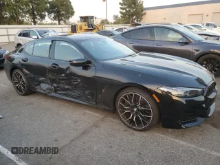 2023 BMW 8 Series 840i with VIN WBAGV2C01PCK95705, listed as a Copart auction lot 83424634 with 23,674 mi miles and Salvage Title. Bid and sale history available at carsss.com. Image 4.