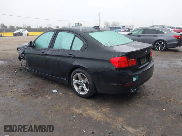 2014 BMW 3 Series 328i with VIN WBA3C1C55EK113128, listed as a IAAI auction lot 41259472 with 82,798 mi miles. Bid and sale history available at carsss.com. Image 3.