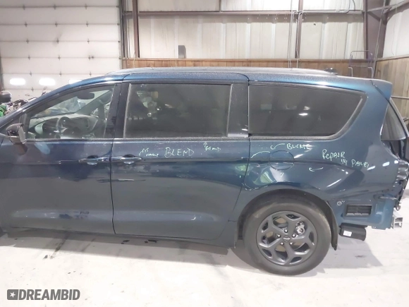 2023 Chrysler Pacifica Hybrid Limited with VIN 2C4RC1S74PR554723, listed as a IAAI auction lot 41317141 with 16,960 mi miles. Bid and sale history available at carsss.com. Image 19.