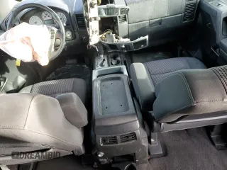 2013 Nissan Titan Pro-4X with VIN 1N6BA0EC2DN305708, listed as a Copart auction lot 45329275 with 68,636 mi miles and Salvage title. Bid and sale history available at DreamBid. Image 8.