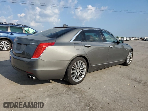 2016 Cadillac CT6 Luxury RWD with VIN 1G6KC5RX1GU158835, listed as a Copart auction lot 67373604 with 165,614 mi miles and Salvage title. Bid and sale history available at DreamBid. Image 3.