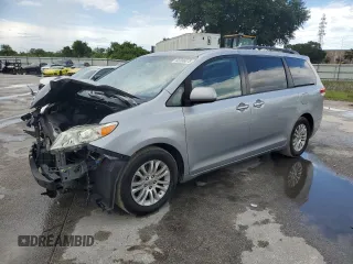 2011 Toyota Sienna XLE AAS with VIN 5TDYK3DC0BS106659, listed as a Copart auction lot 62306075 with 226,622 mi miles and Salvage title. Bid and sale history available at DreamBid. Image 1.