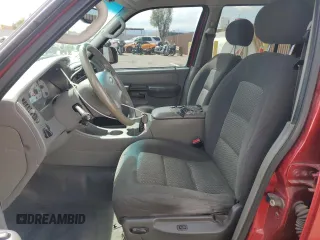 2003 Ford Explorer Sport Trac XLS z VIN 1FMZU67EX3UA71831, wystawiony jako Copart lot #57167025 z przebiegiem 145 290 mil mil oraz Szkoda całkowita • Salvage title. Historia ofert i sprzedaży dostępna na DreamBid. Obrazek 7.