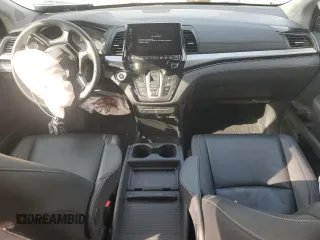 2023 Honda Odyssey Touring with VIN 5FNRL6H83PB053962, listed as a Copart auction lot 51461865 with 24,808 mi miles and Salvage Title. Bid and sale history available at DreamBid. Image 8.