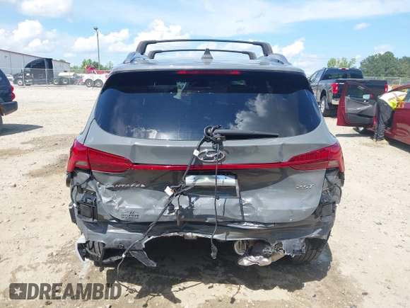 2023 Hyundai Santa Fe Calligraphy with VIN 5NMS54ALXPH633514, listed as a IAAI auction lot 42238114 with 12,969 mi miles and . Bid and sale history available at DreamBid. Image 16.