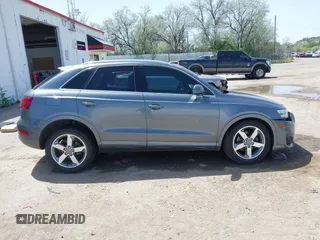 2015 Audi Q3 Premium Plus с VIN WA1EFCFS6FR010285, выставлен на аукционе IAAI как лот 42202068 с пробегом 104 945 миль миль и . История ставок и продаж доступна на DreamBid. Изображение 14.
