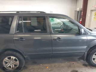 2005 Honda Pilot EX-L with RES with VIN 2HKYF18655H521175, listed as a IAAI auction lot 41490812 with 357,033 mi miles. Bid and sale history available at carsss.com. Image 14.