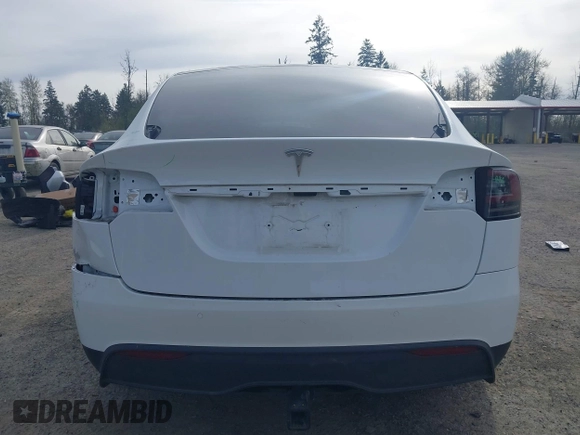2022 Tesla Model X with VIN 7SAXCBE54NF363113, listed as a IAAI auction lot 41978397 with 27,166 mi miles. Bid and sale history available at carsss.com. Image 17.